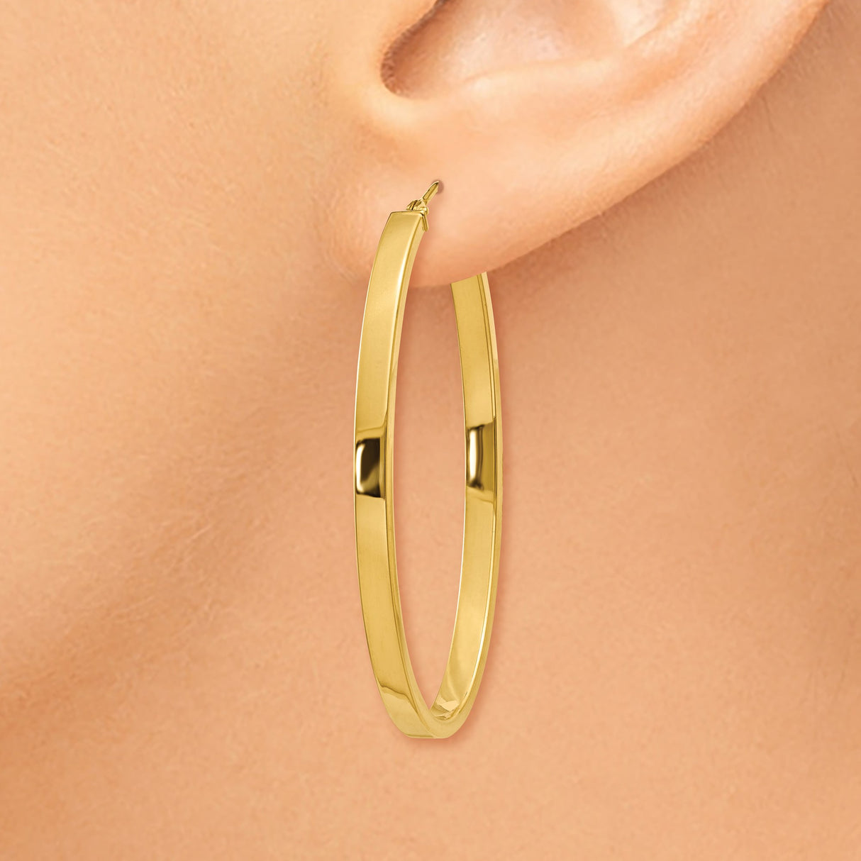 14k Yellow Gold Oval Hoop Earrings with High Polish Finish and Latch Back Closure