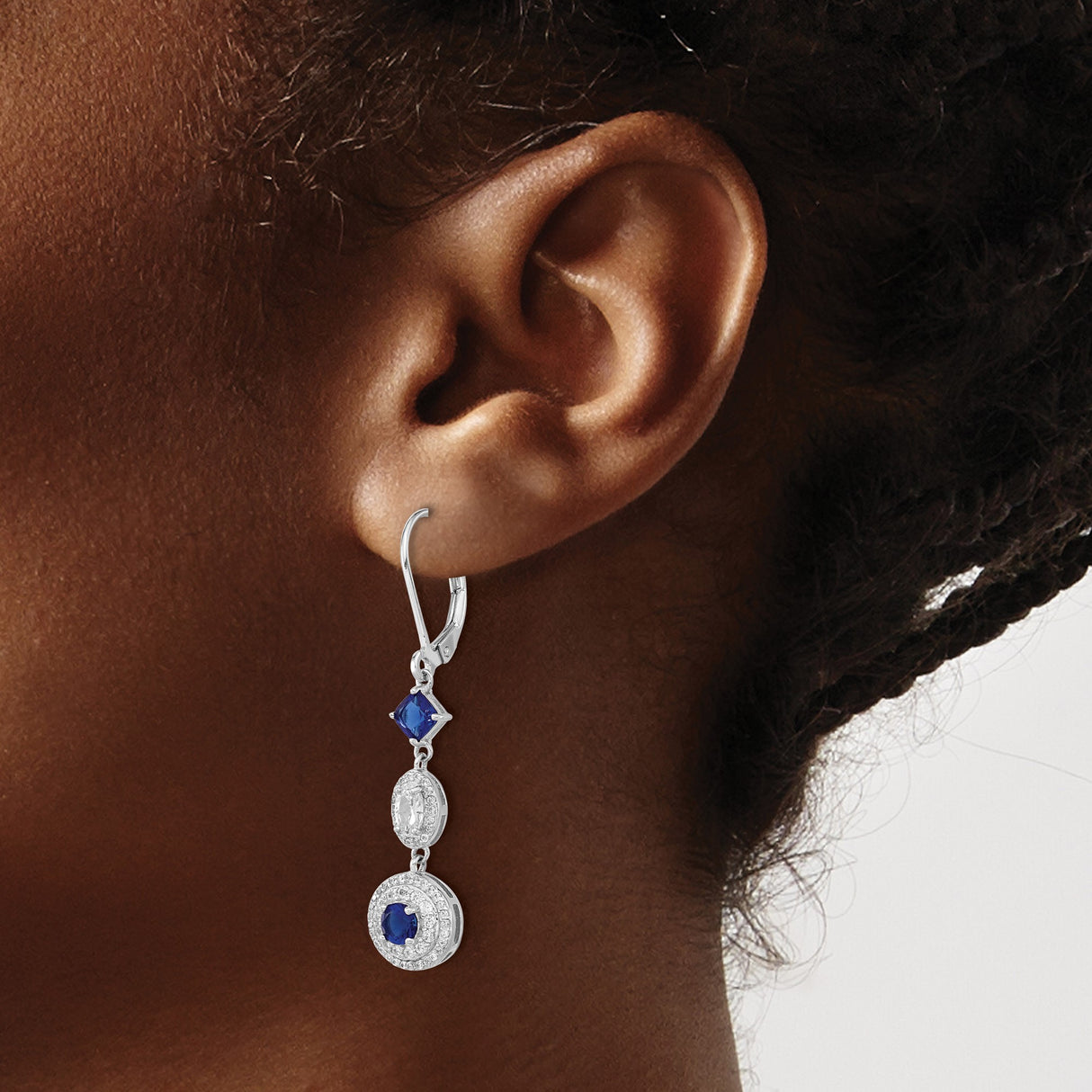 Sterling Silver Dangle Earrings with Oval Blue Sapphires, Round Accents, and Cubic Zirconia