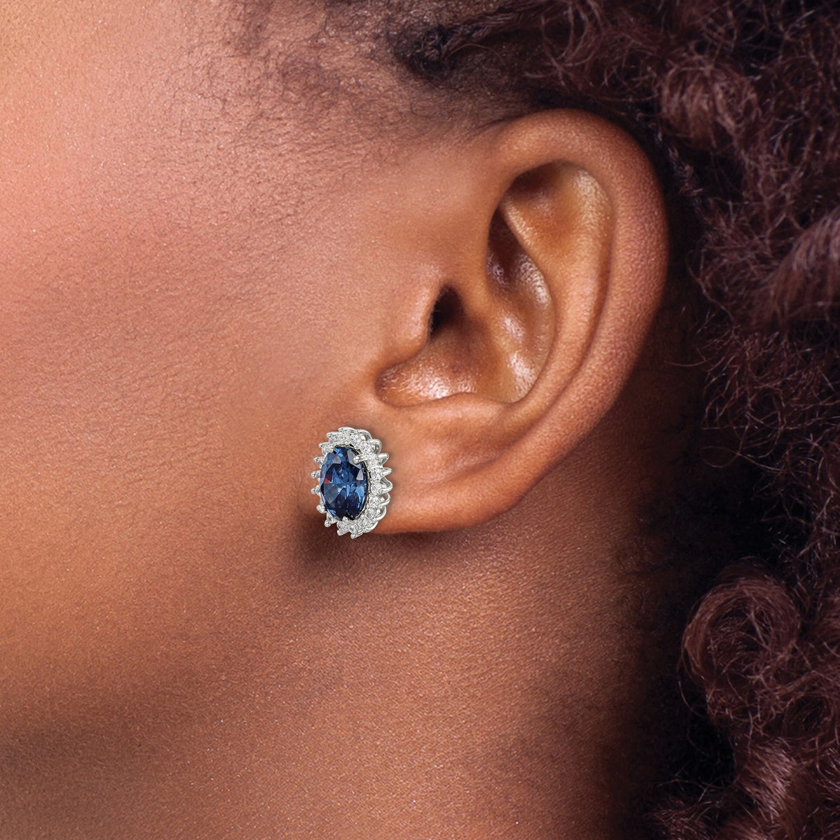 Sterling Silver Stud Earrings with Oval Blue Gemstone and Cubic Zirconia Halo