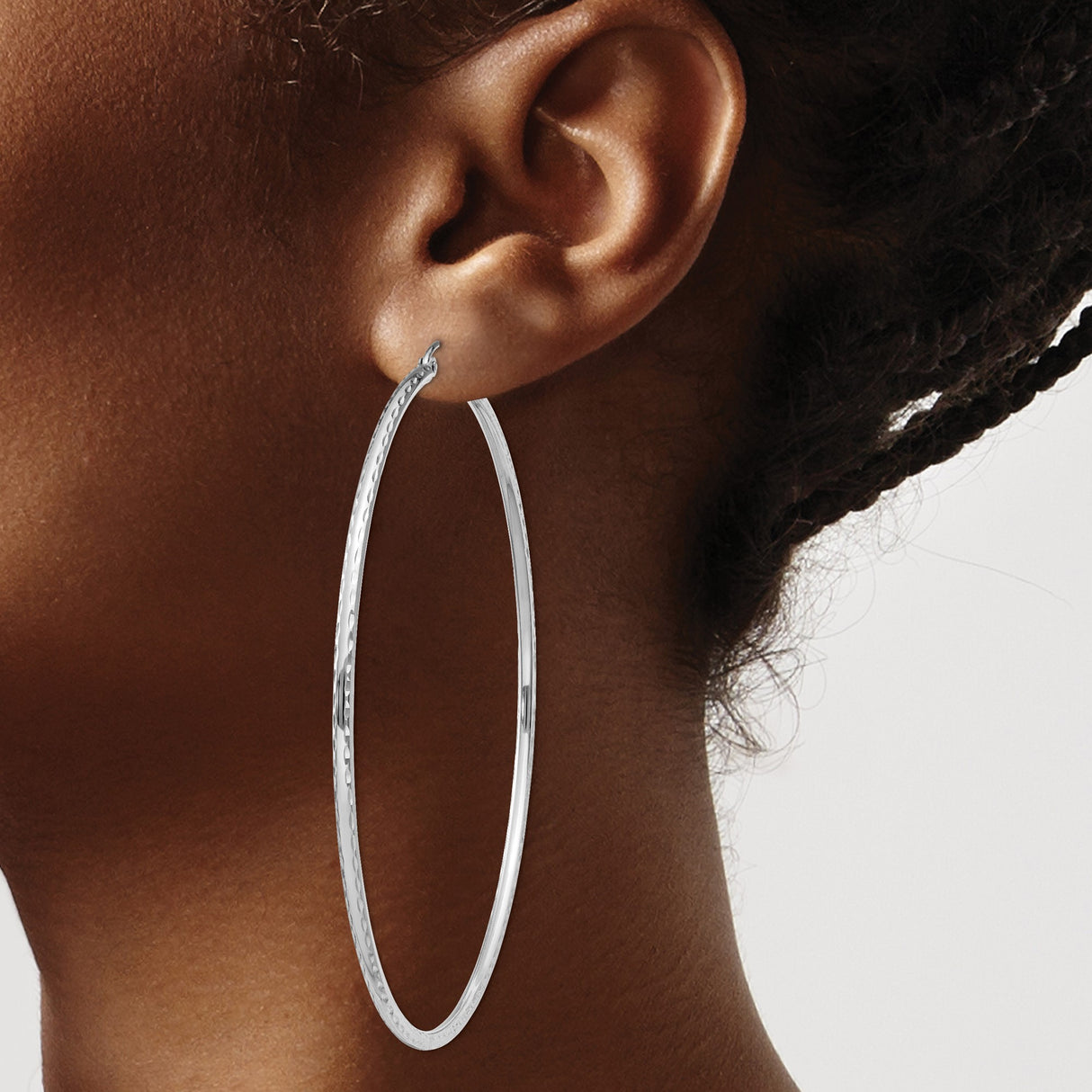 Sterling Silver Hoop Earrings with Polished Finish and Diamond Cut Textured Design