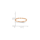 10k Rose Gold Diamond Cut wedding band ring shown for scale
