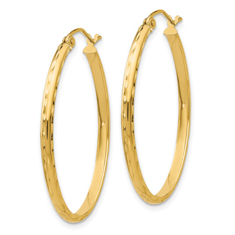 10k Yellow Gold Oval Hoop Earrings with Diamond Cut Textured Design