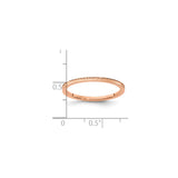 10k Rose Gold wedding band ring shown for scale