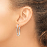 14k White Gold Oval Hoop Earrings with Twisted Design and Channel Set Cubic Zirconia