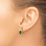 10k Yellow Gold Stud Earrings with Created Emerald and Crossover Design Featuring Cubic Zirconia