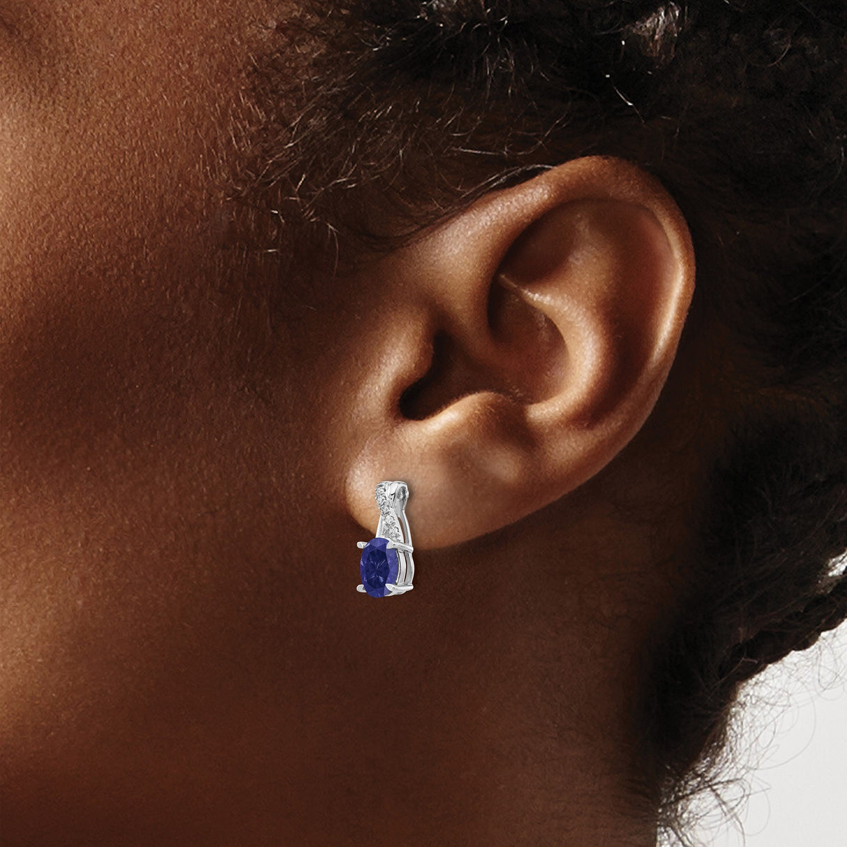 14k White Gold Drop Earrings with Oval Cut Sapphire and Diamond Accents in Crossover Design