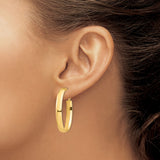 14k Yellow Gold Oval Hoop Earrings with Omega Back, Smooth Polished Finish, Lightweight Classic Style