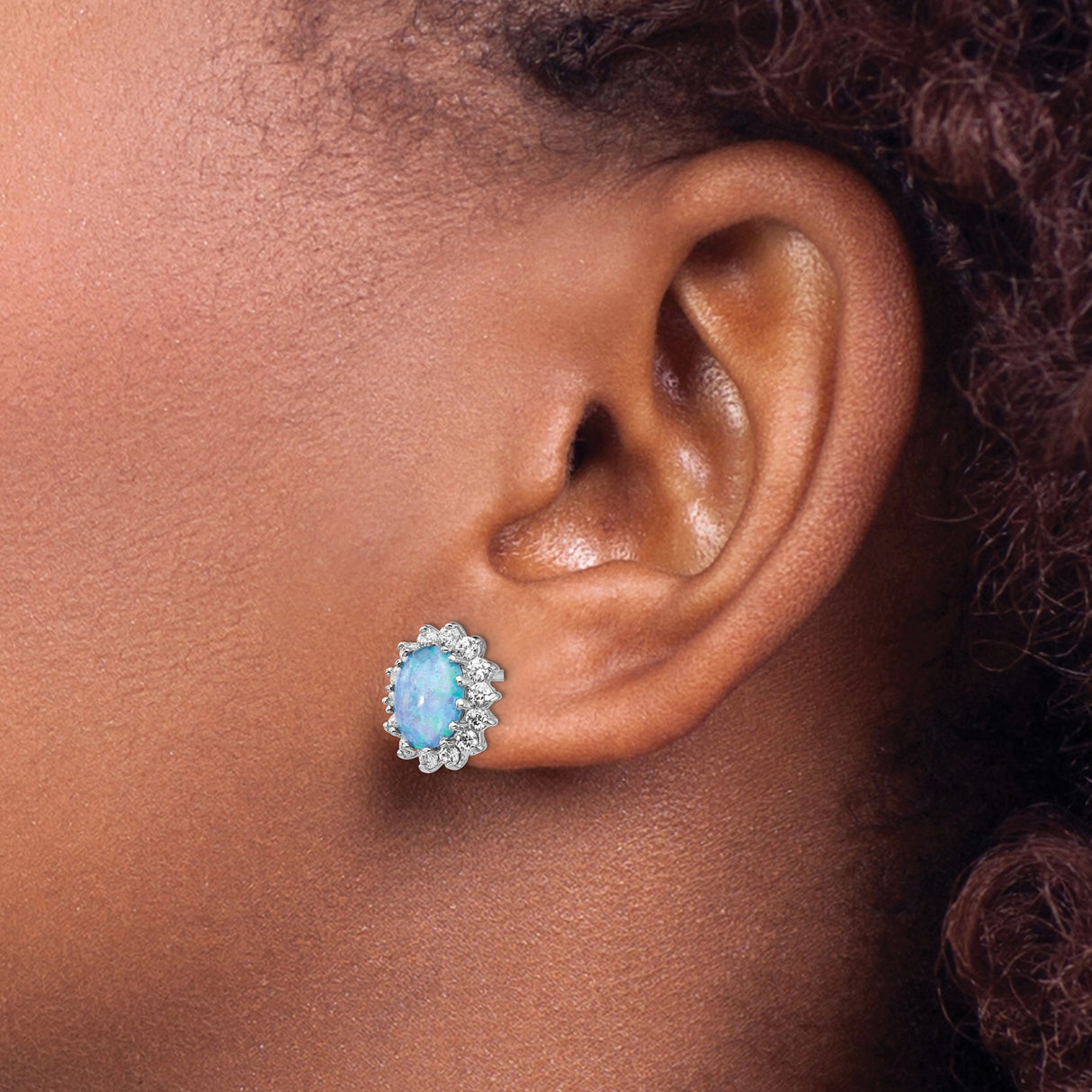 Sterling Silver Stud Earrings with Oval Created Opal and Cubic Zirconia Halo in Floral Setting