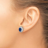 Sterling Silver Stud Earrings with Oval Blue Spinel and Cubic Zirconia Halo Cluster