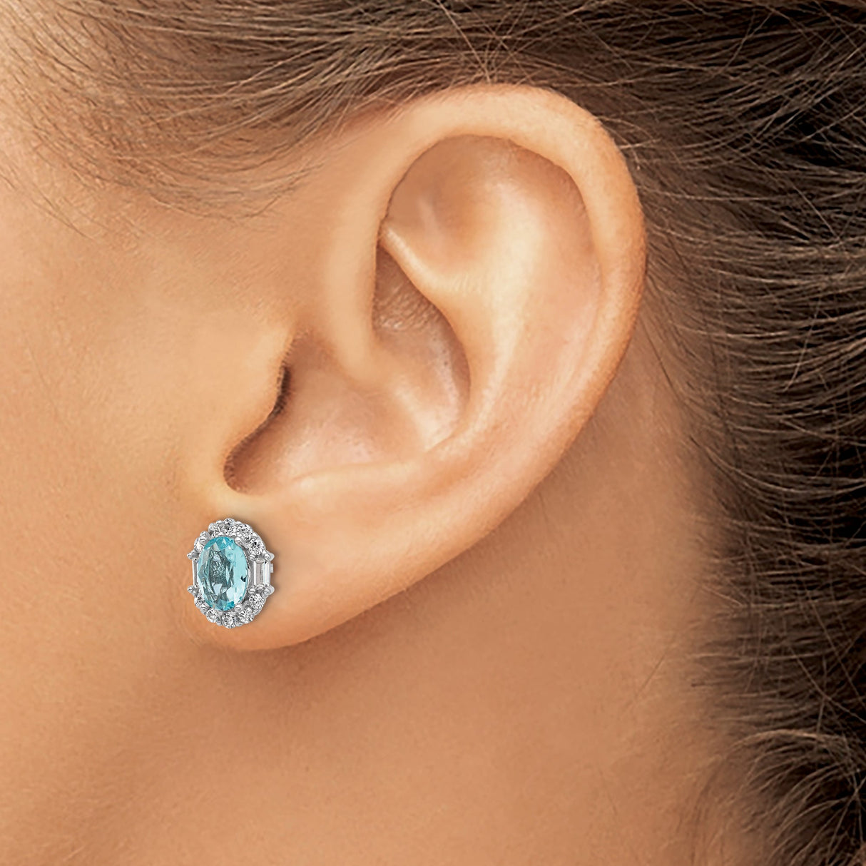 Sterling Silver Stud Earrings with Oval Cut Cubic Zirconia and Halo of Round and Baguette Crystals