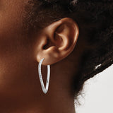Sterling Silver Twisted Oval Hoop Earrings with Diamond Mystique and Crossover Design