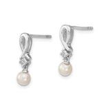 Sterling Silver Drop Earrings with White Pearl and Cubic Zirconia Ribbon Design