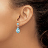 Sterling Silver Dangle Earrings with Pear Shaped Sky Blue Topaz and Star Motif Design