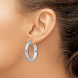 Sterling Silver Hoop Earrings with Textured Brushed Finish and Polished Oval Accents