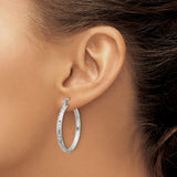 Sterling Silver Hoop Earrings with Textured Diamond Cut Finish and Latch Closure