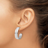 Sterling Silver Hoop Earrings with Polished Finish and Raised Circle Pattern