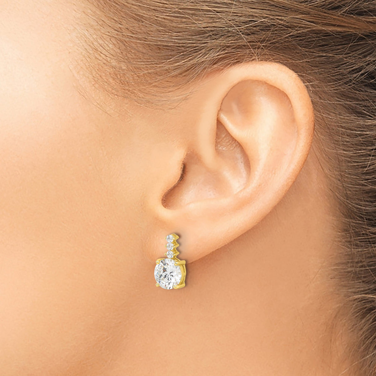 Sterling Silver Stud Earrings with Graduated Four-Stone Round Cubic Zirconia Design