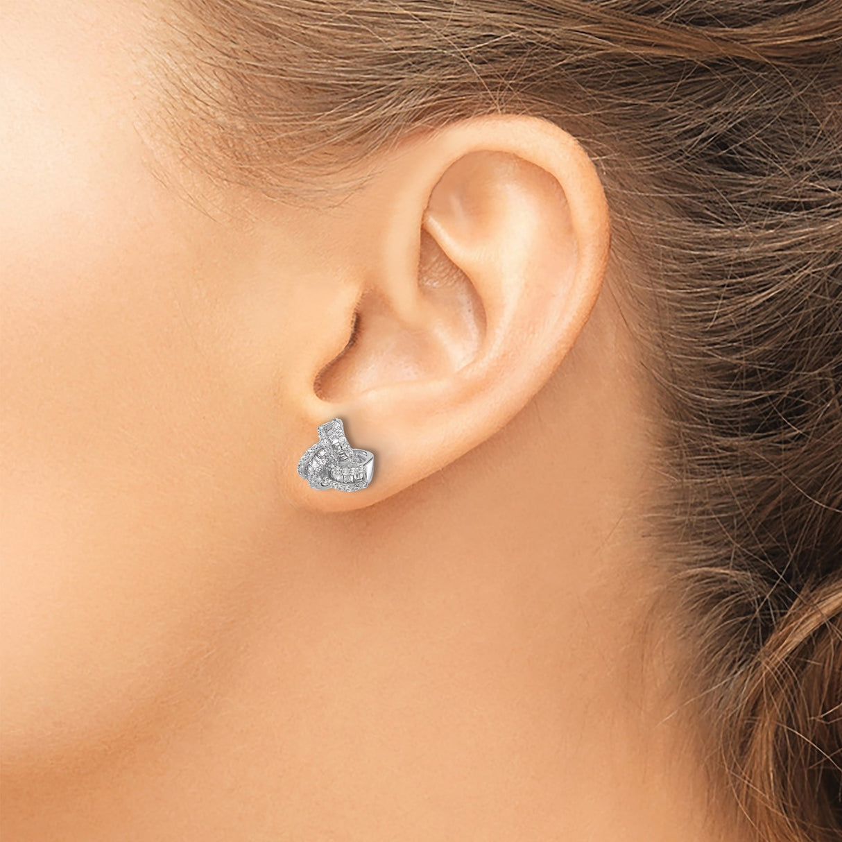 Sterling Silver Knot Stud Earrings Round And Baguette CZ