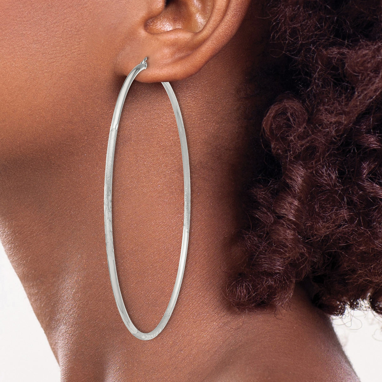 Sterling Silver Hoop Earrings with Polished Finish and Etched Leaf Pattern