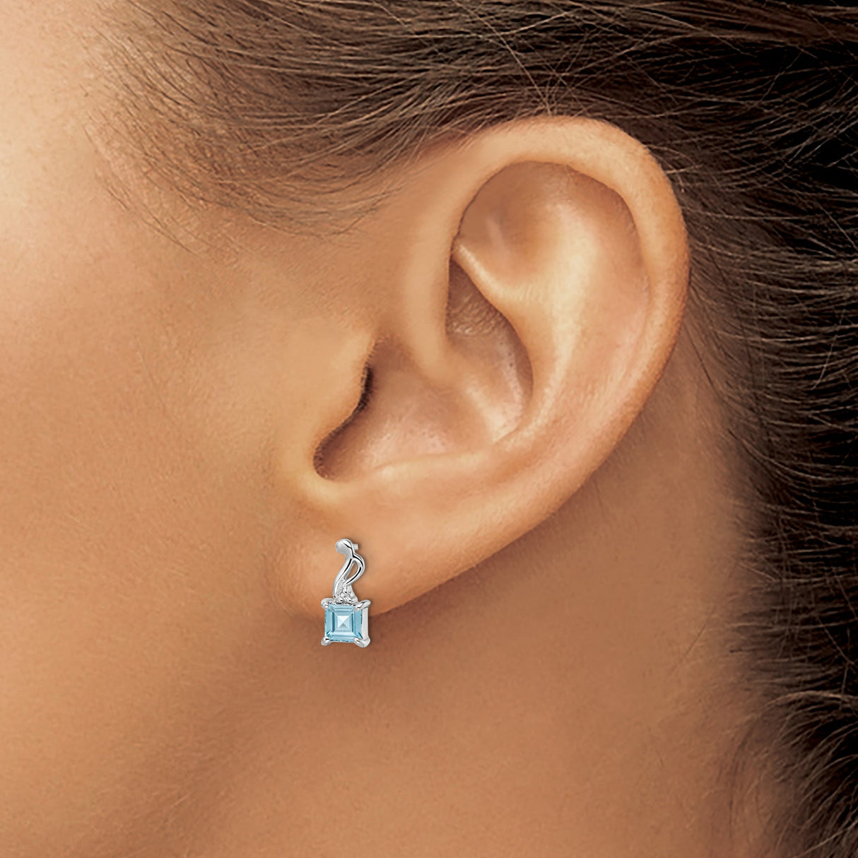 Sterling Silver Stud Earrings with Sky Blue Topaz and Diamond Ribbon Design