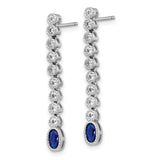 Sterling Silver Drop Earrings with Oval Cut Blue Gemstone and White Accents, Rhodium Plated Dangle Design