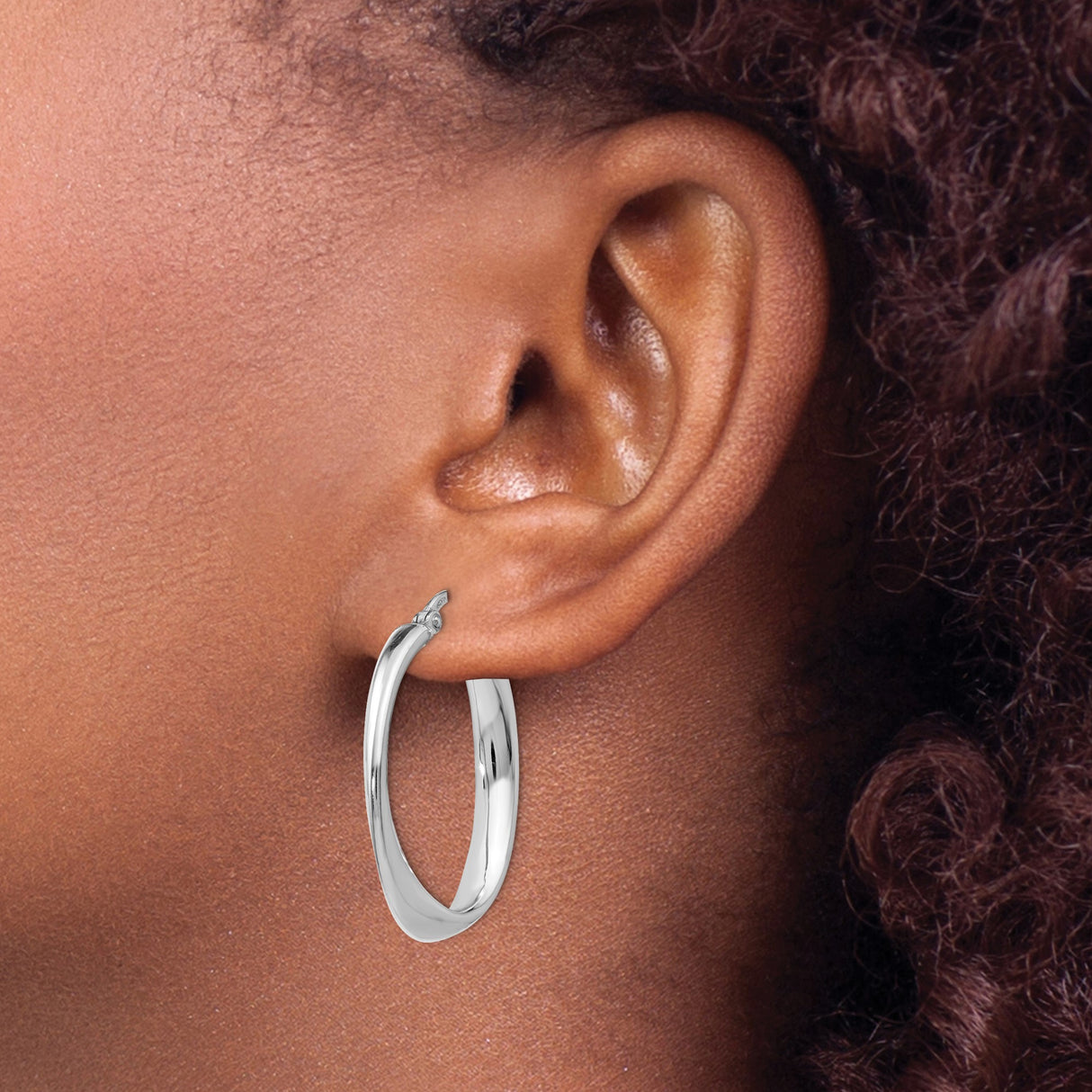 Sterling Silver Twisted Oval Hoop Earrings with Hinged Snap Closure and High Polish Finish