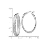 Sterling Silver Oval Hoop Earrings with Textured Star Pattern and Diamond Cut Detail