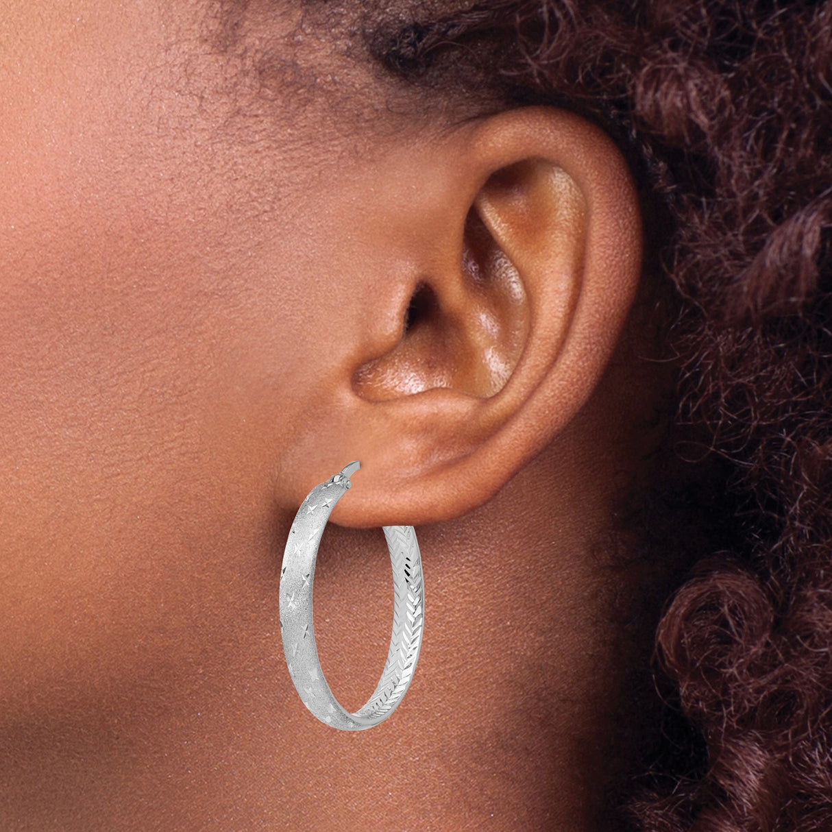 Sterling Silver Hoop Earrings with Diamond-Cut Chevron and Star Pattern