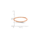 14k Rose Gold Domed wedding band ring shown for scale