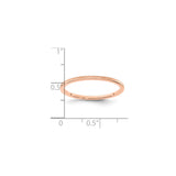 14k Rose Gold wedding band ring shown for scale
