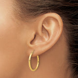 14k Yellow Gold Hoop Earrings with Twisted Diamond-Cut Design and Polished Satin Finish