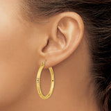 14k Yellow Gold Hoop Earrings with Textured Leaf and Diamond-Cut Detailing