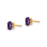 14k Yellow Gold Amethyst Stud Earrings with Faceted Oval Gemstones in Four Prong Setting