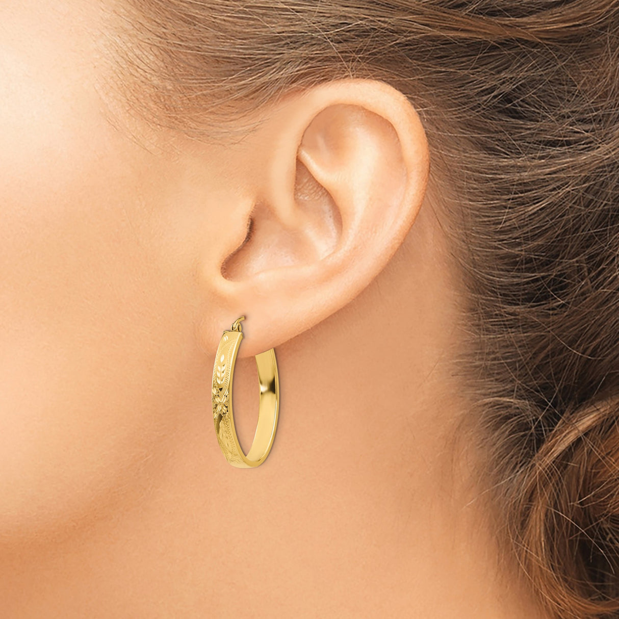 14k Yellow Gold Oval Hoop Earrings with Floral and Leaf Motif, Polished and Textured Finish